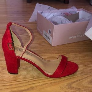 Red strappy heels